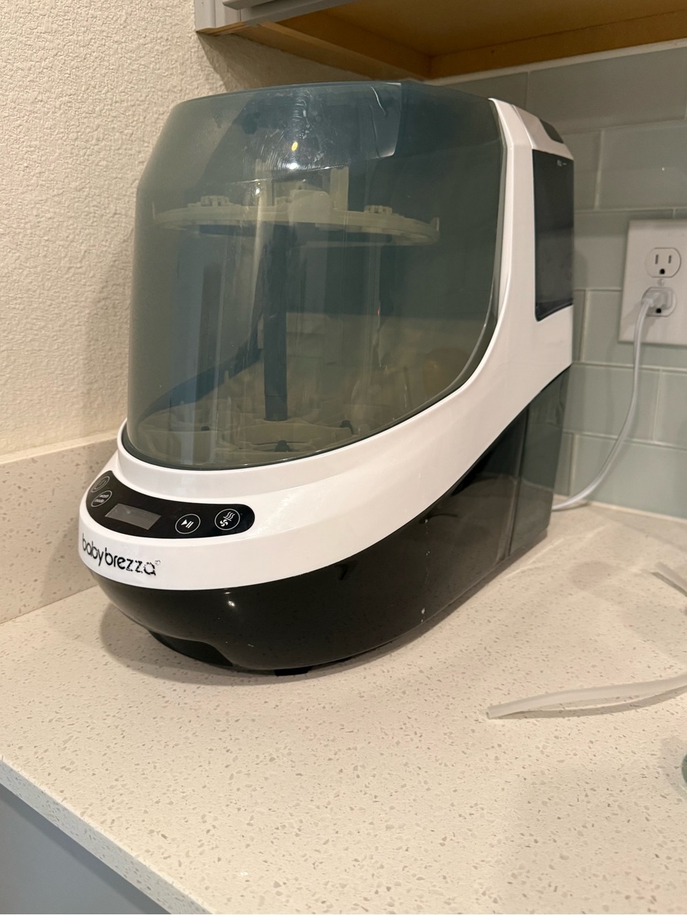 Baby Brezza Steam Sterilizer & Dryer in White and Black